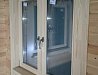 Установка деревянных окон и дверей из сосны в коттеджном поселке