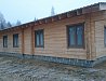 Установка деревянных окон и дверей из сосны в коттеджном поселке